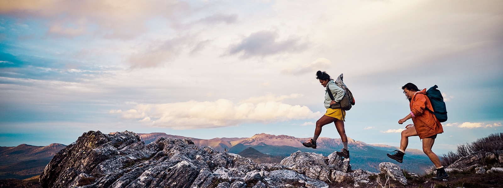 two hikers on a mountain