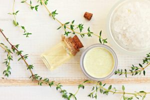 Facial serum bottle next to moisturizer jar | Vitacost.com/Blog