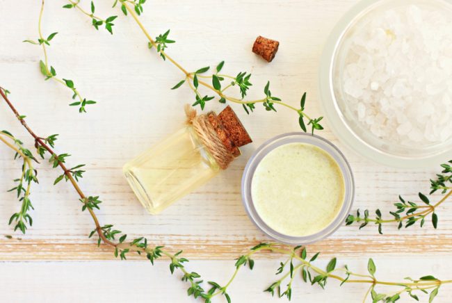 Facial serum bottle next to moisturizer jar | Vitacost.com/Blog