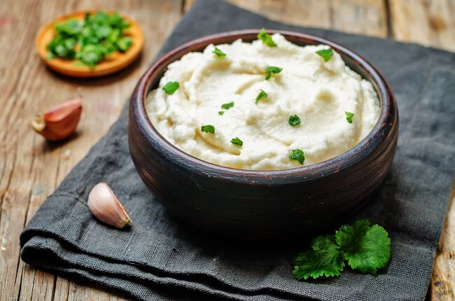 Mashed cauliflower in brown bowl | Vitacost.com/blog