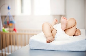 Baby Lying on Changing Table Awaiting Diaper Change | www.vitacost.com/blog