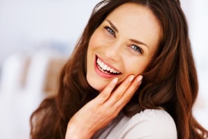 Woman with brown hair smiling | www.vitacost.com/blog