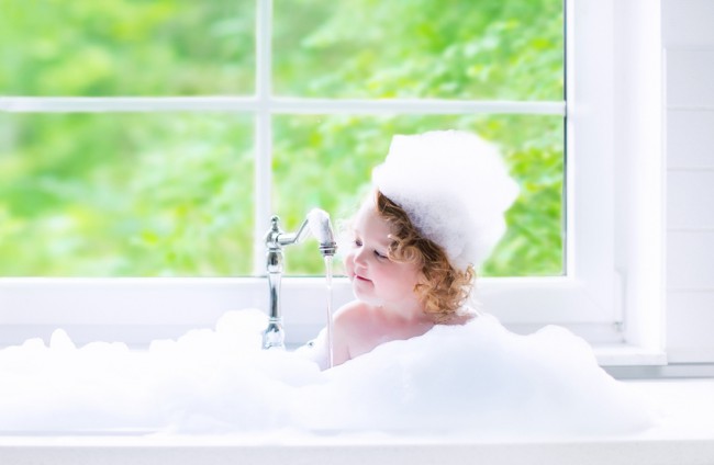 Toddler With Shampoo on Her Head Sitting in Bubble Bath | www.vitacost.com/blog