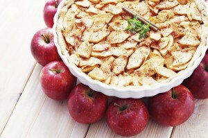Raw, vegan apple pie surrounded by whole red apples | www.vitacost.com/blog
