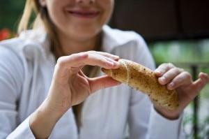 Celiac Woman Eating Gluten-Free Bread