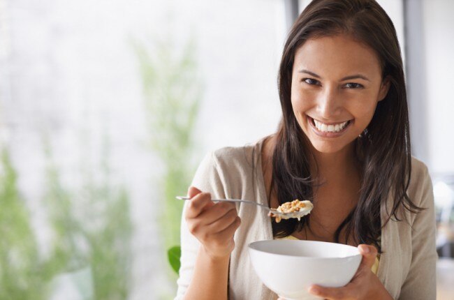Kosher Food: Is it Healthier? Woman Eating Bowl of Kosher Cereal | Vitacost.com/Blog