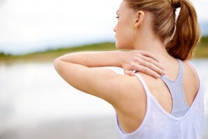 Woman With Inflammation Rubbing Neck