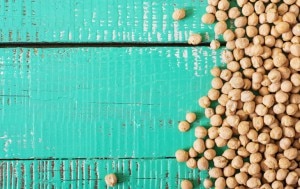 Chickpeas Scattered on a Teal Blue Wooden Surface