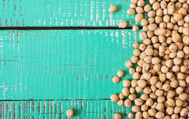 Chickpeas Scattered on a Teal Blue Wooden Surface