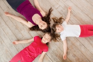 Three Kids Meditating to Manage Stress
