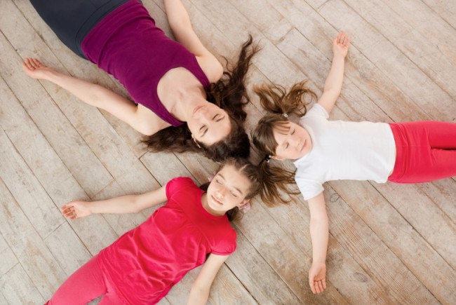 Three Kids Meditating to Manage Stress
