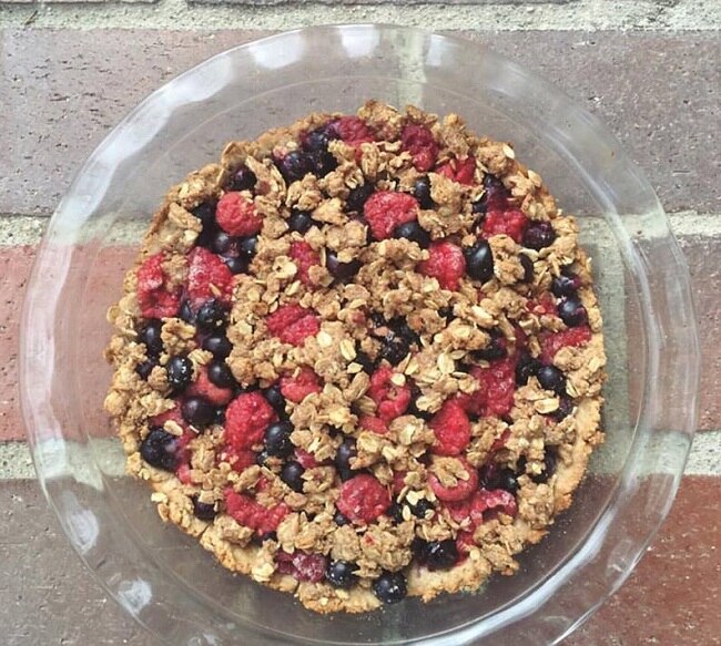 Guilt-Free Mixed Berry Pie Recipe Blueberry and raspberry oat crumble in a glass pie dish