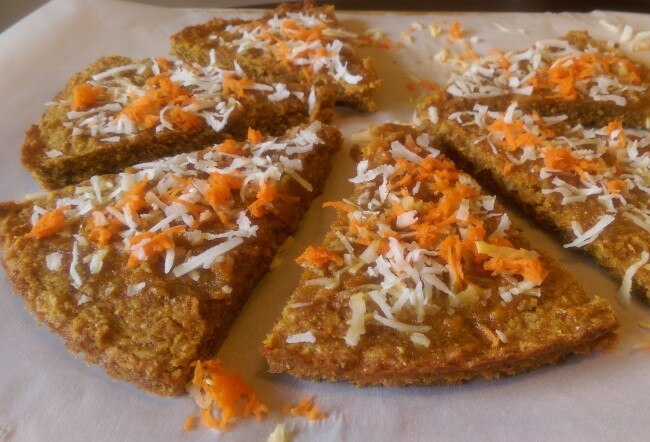 Vegan Carrot Cake Dessert Pizza Recipe Slices of vegan carrot cake dessert pizza on parchment paper | www.vitacost.com/blog