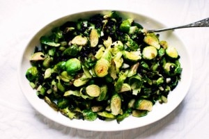 Black rice and roasted Brussels sprouts side dish on white plate #sidedishes www.vitacost.com/blog