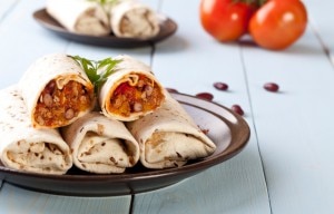 Vegetarian Jambalaya Burritos Stacked on Plate