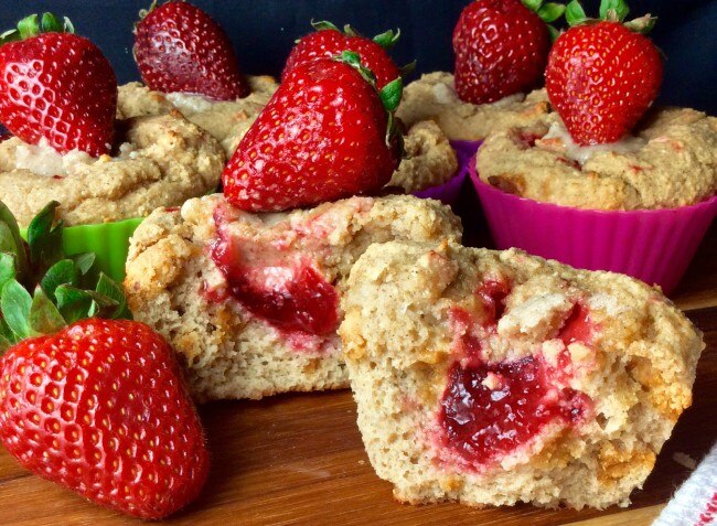 Peanut butter cupcakes filled with jelly and topped with strawberries www.vitacost.com/blog