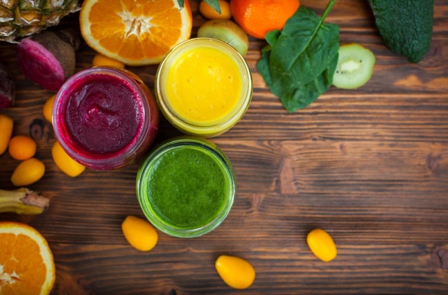 Colorful Fruit & Protein Smoothies on Wooden Table www.vitacost.com/blog
