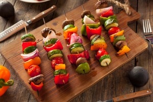 Vegetable skewers on cutting board #bbq www.vitacost.com/blog