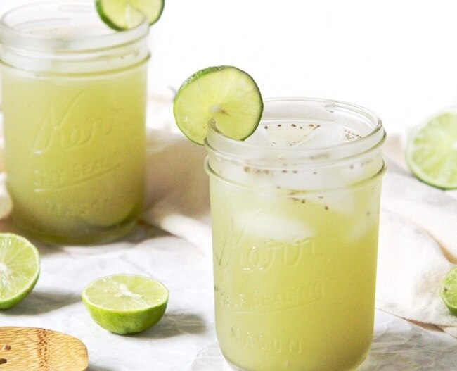 Limeade with Chia & Matcha Green Tea Powder  Chia-Matcha Limeade in jar with ice and limes www.vitacost.com/blog