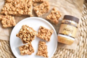 Healthy peanut butter cereal bars on white plate #nobake #recipe | www.vitacost.com/blog