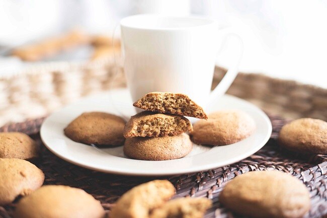 Chai Spice Protein Cookies Chai spice protein cookies on white plate with white mug | www.vitacost.com/blog