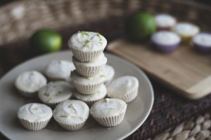 Mini coconut lime protein pies stacked on white place | www.vitacost.com/blog