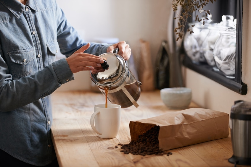 Coffee in the morning Pouring coffee into mug