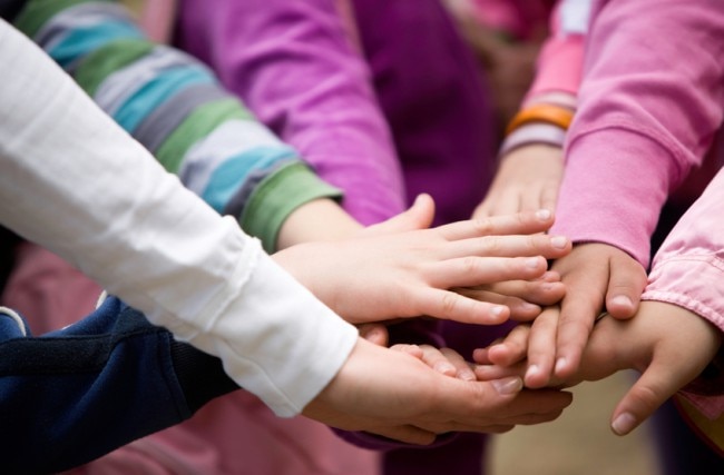 Safe & Natural Hand Sanitizer Picks for Kids Group of Young Children Piling Hands Together | www.vitacost.com/blog