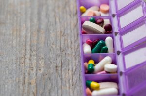 Puple Compartmental Pill Storage Container With Vitamins, Minerals and Other Supplements | Vitacost.com/blog