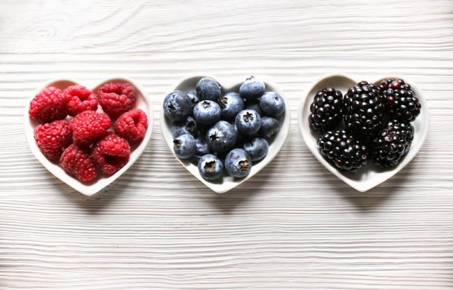 Are Some Antioxidant Foods More Potent Than Others? Foods High in Antioxidants Including Blueberries, Raspberries and Blackberries in Heart-Shaped Bowls | Vitacost.com/blog