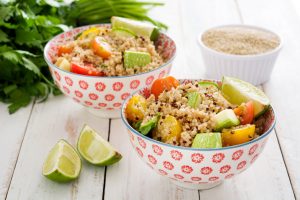 Quinoa with zucchini, tomato and herbs in a bowl | Vitacost.com/Blog