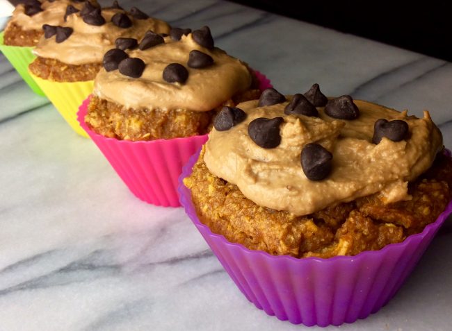 Pumpkin-coconut muffins with peanut butter frosting and chocolate chips