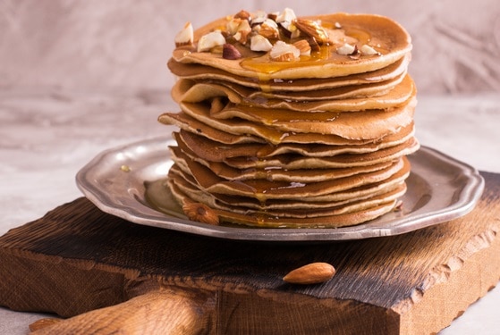 Almond Flour Pumpkin Chocolate Chip Pancakes Stack of pumpkin walnut pancakes with almonds, walnuts and syrup | Vitacost.com/Blog
