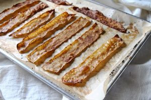 Crispy vegan bacon made from rice paper on baking sheet | Vitacost.com/Blog