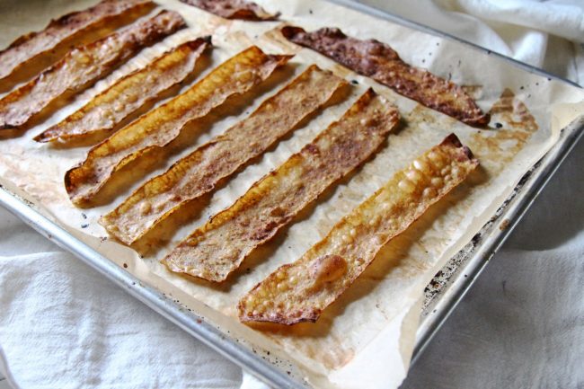 Crispy vegan bacon made from rice paper on baking sheet | Vitacost.com/Blog