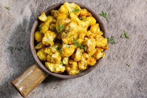 Roasted Cauliflower Popcorn in a brown bowl #recipe | Vitacost.com/blog