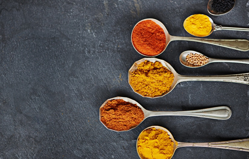 Assortment of Fall Spices on Spoons Ready to Be Used in Natural Cleaning Recipes | Vitacost.com/blog