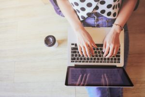 Woman With Laptop Searching for Nutrition and Health Information Online | Vitacost.com/blog