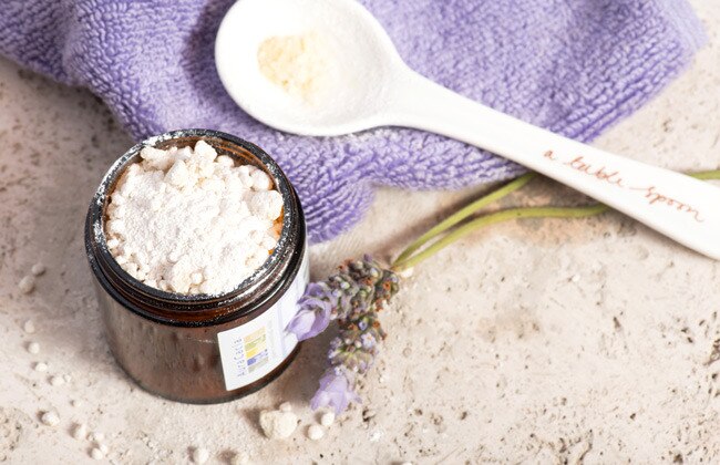 DIY Aromatherapy Bath Salts Recipe Jar of Homemade Bath Salts Made With Aura Cacia Essential Oils | Vitacost.com/blog