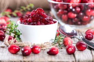 Homemade cranberry sauce with chia seeds in ramekin | Vitacost.com/blog