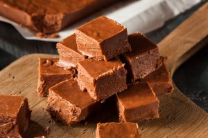 Homemade sweet potato fudge on wood platter #sweetpotatobrownies | Vitacost.com/blog