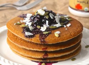 Stack of gluten-free pancakes with toppings | Vitacost.com/blog