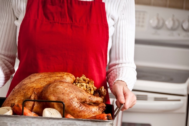 Woman in Red Apron Shows How to Cook a Turkey 5 Ways | Vitacost.com/blog