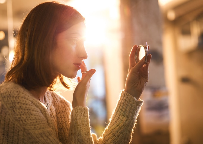 Woman Applying Collagen Cream to Face for Anti-Aging Benefits | Vitacost.com/blog
