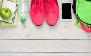 Fitness and Diet Tools Lined Up on Wooden Table to Help With New Year's Resolutions | Vitacost.com/blog