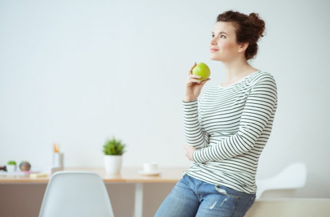 One Week on a Vegan Diet: Here's What I Learned Woman Trying a Vegan Diet Eating an Apple | Vitacost.com/blog
