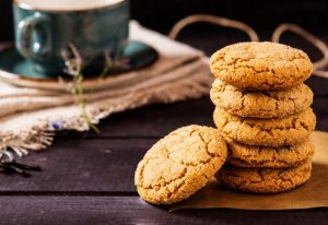 A Stack of Soft Gingerbread Cookies on Wood Table with Mug | Vitacost.com/blog