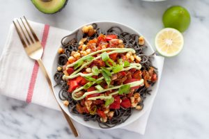 Black bean noodle bowl with avocado sour cream #noodlesrecipe #southwestbowl | Vitacost.com/blog