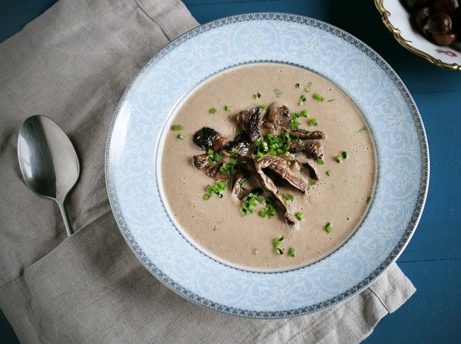 Turkey Soup from Leftover Meat & Veggies Leftover Turkey Soup in White Bowl on Beige Napkin #recipe | blog.vitacost.com