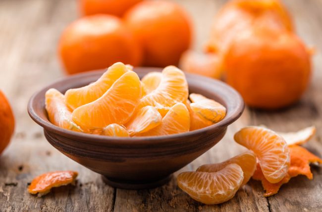 Vitamin C-Rich Tangerine Slices in Wooden Bowl | Vitacost.com/blog